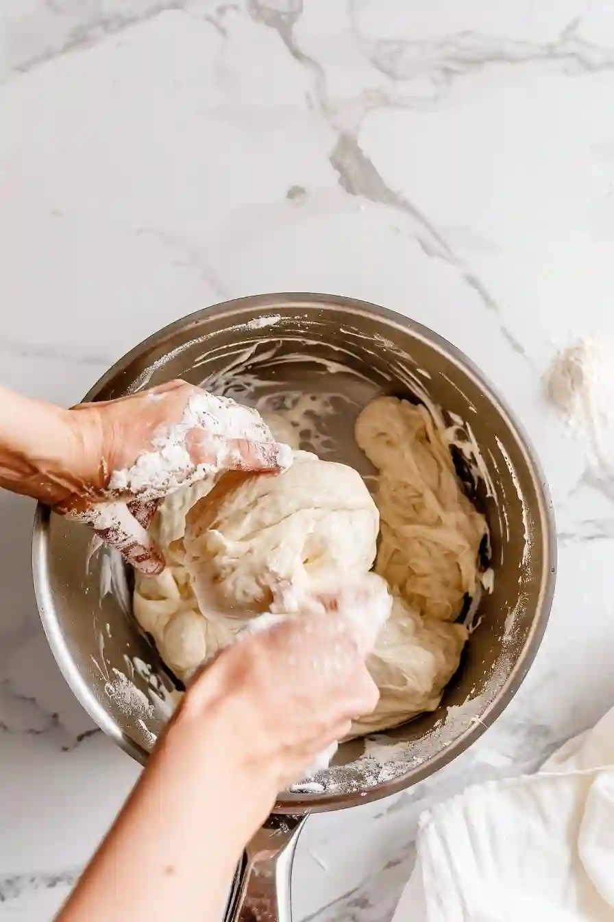 Smooth churro dough forming inside saucepan after adding flour