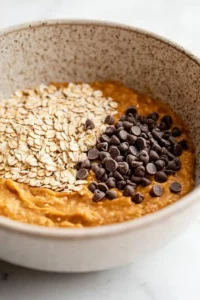 No-Bake Pumpkin Spice Energy Balls 5 Gluten-free rolled oats, chia seeds, chocolate chips, and pumpkin pie spice mixed into a pumpkin peanut butter mixture.